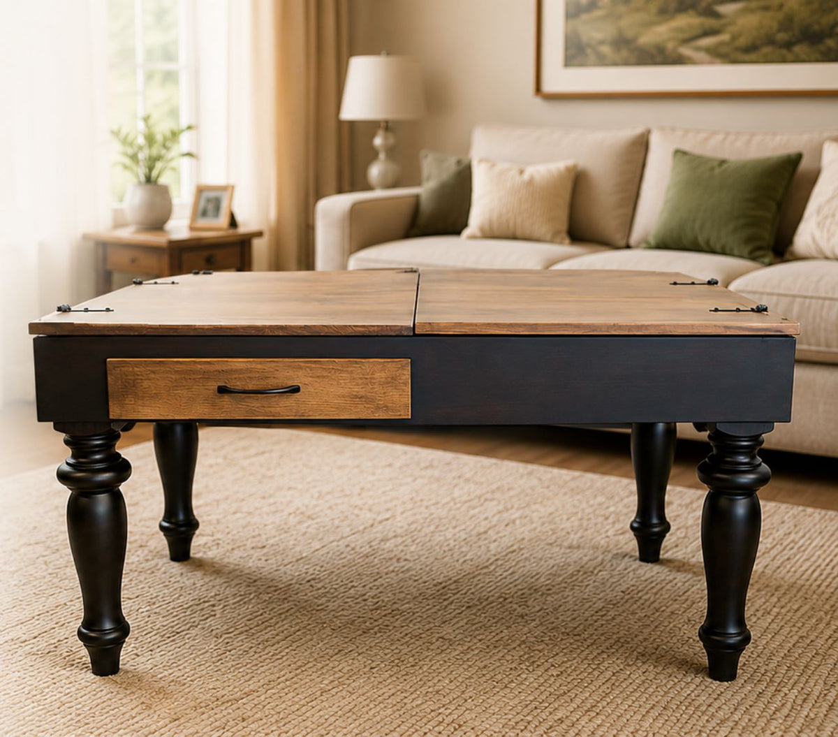A 2 tone jigsaw puzzle coffee table with a dark black frame and turned black legs, featuring a single drawer with a medium brown wood handle on the front. The tabletop is made of light brown wood with a split open top.