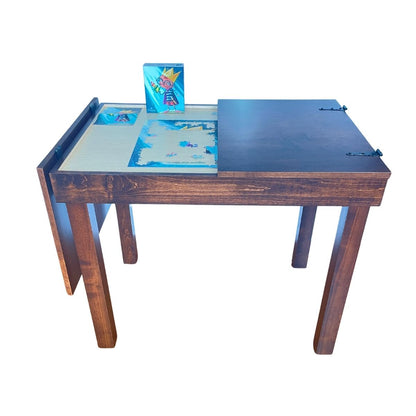 A jigsaw puzzle wooden table shown open on a plain white background, with a puzzle on the recessed area of the open tabletop.